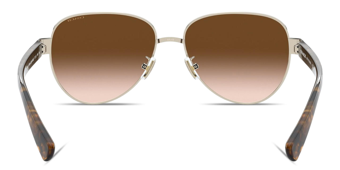 Shop Coach Logo Lettering Pilot Sunglasses in Tortoise online.