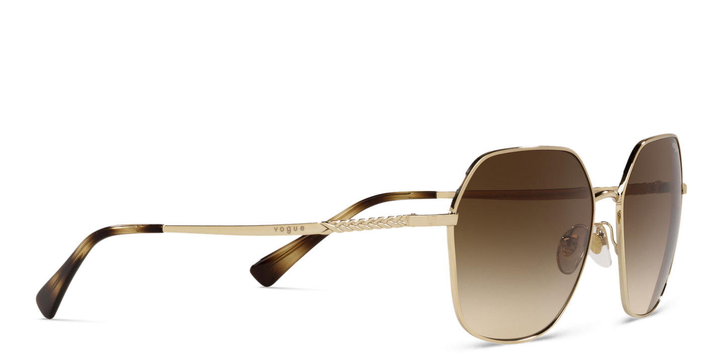 Shop Vogue Eyewear Irregular Sunglasses in Gold online.