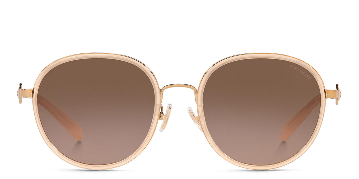 Shop Coach Round Sunglasses in Pink online.