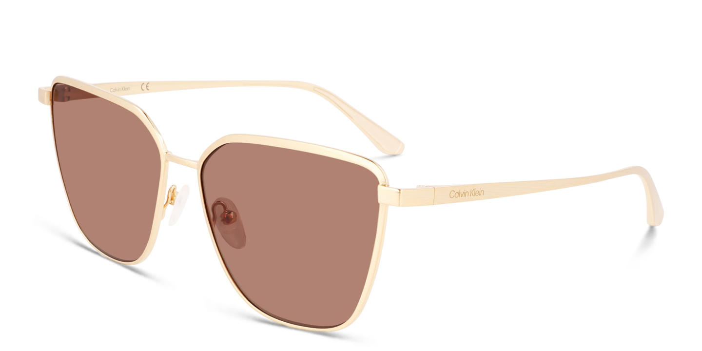Shop Calvin Klein Square Sunglasses in Gold online.