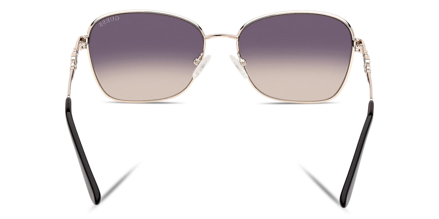 Shop Guess G Logo Cat-Eye Sunglasses in Gold online.