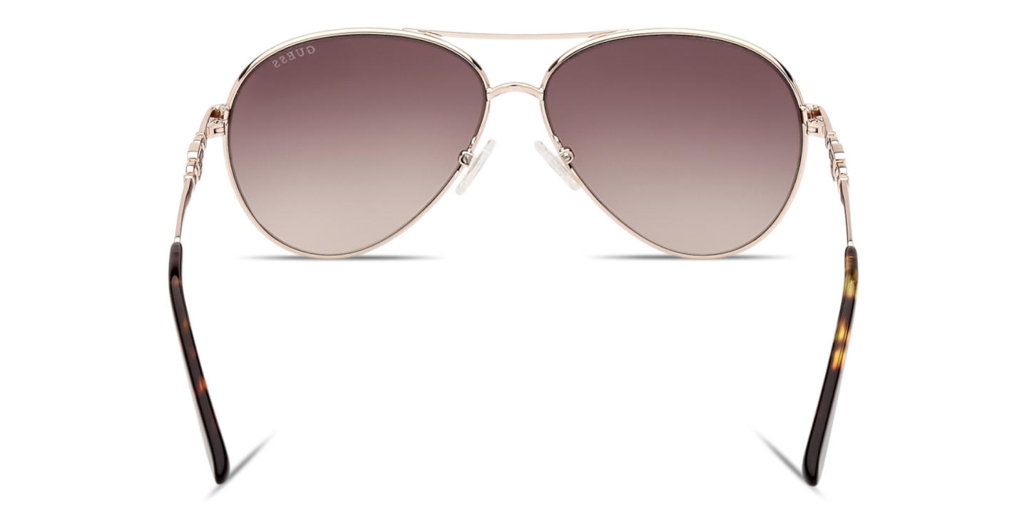 Shop Guess G Logo Aviator Sunglasses in Gold online.