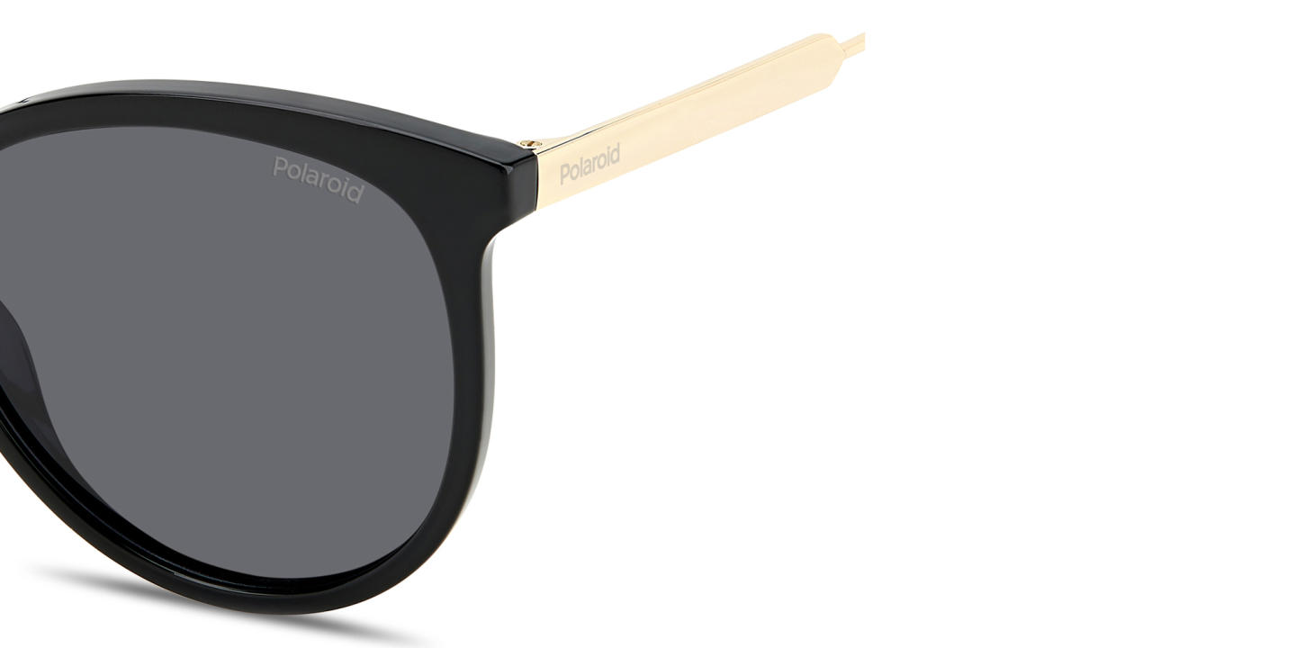 Shop Polaroid Engraved Logo Round Sunglasses in Black online.