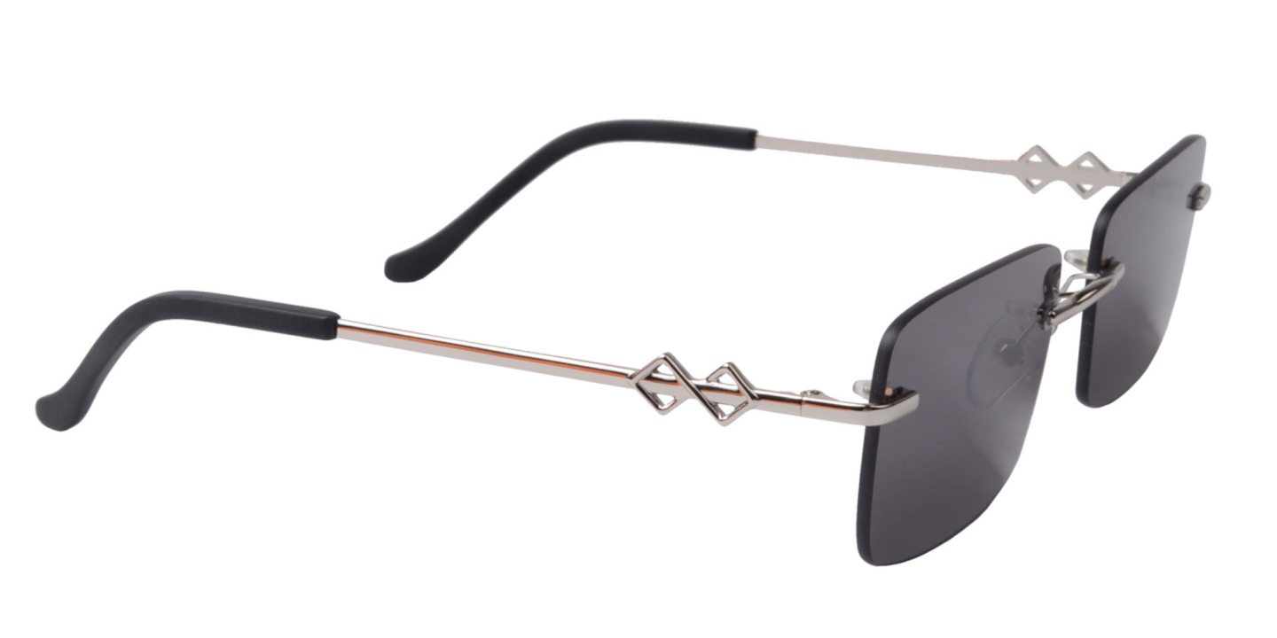 Shop Karen Wazen Layla Rimless Rectangle Sunglasses in Silver online.