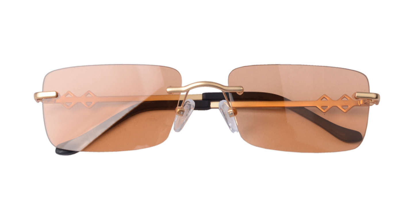 Shop Karen Wazen Layla Rimless Rectangle Sunglasses in Gold online.