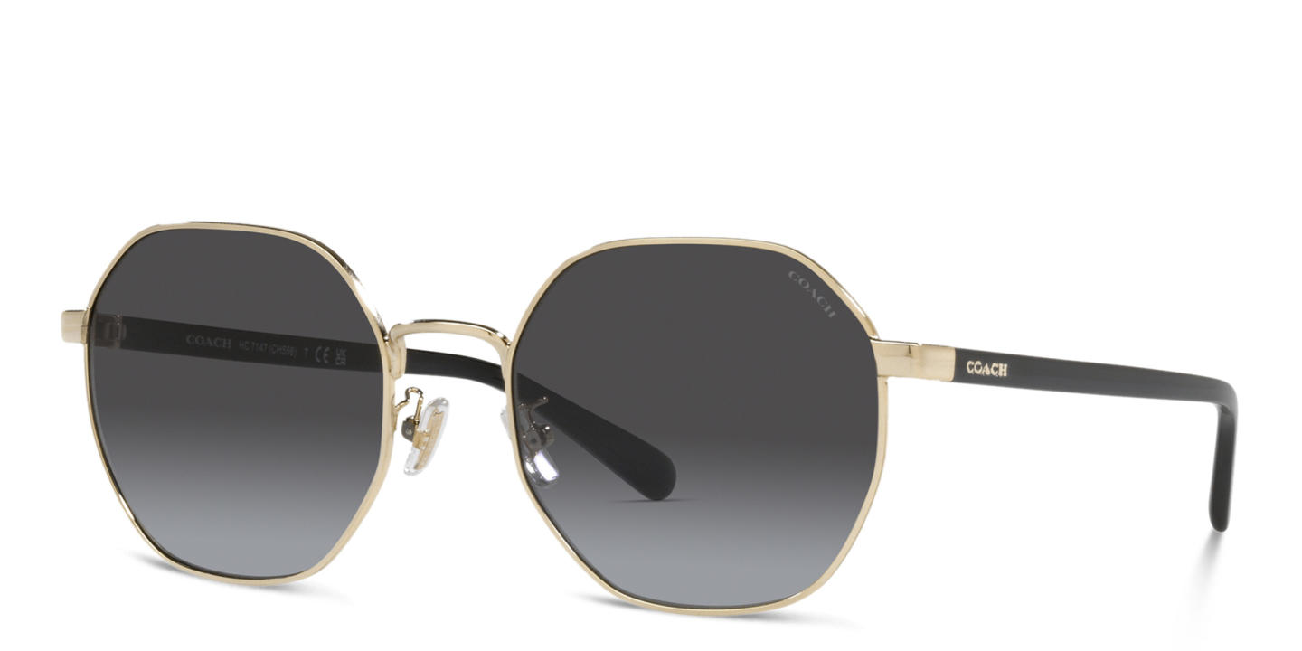 Shop Coach Logo Lettering Irregular Sunglasses in Gold online.