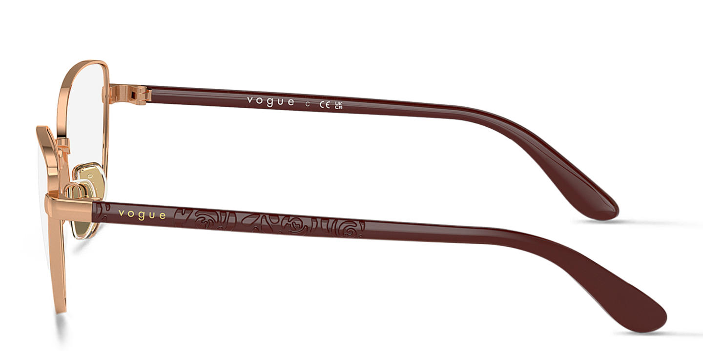 Shop Vogue Eyewear Cat-Eye Eyeglasses in Pale Gold online.