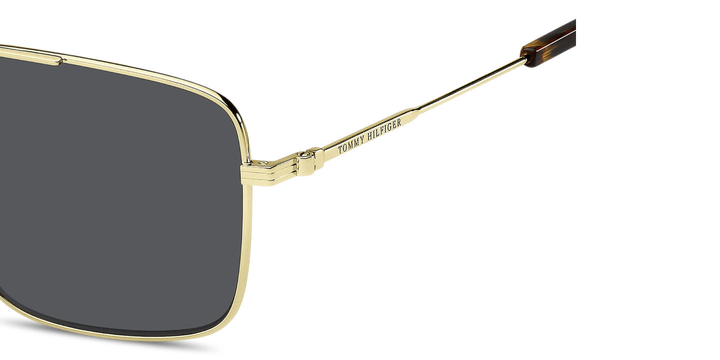 Shop Tommy Hilfiger Engraved Logo Rectangle Sunglasses in Gold online.