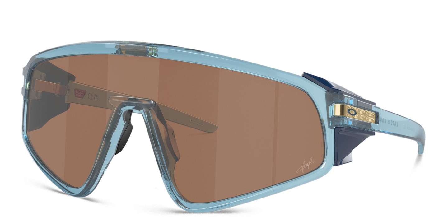 Shop Oakley Latch Panel Unisex Mask Sunglasses in Transparent Blue online.
