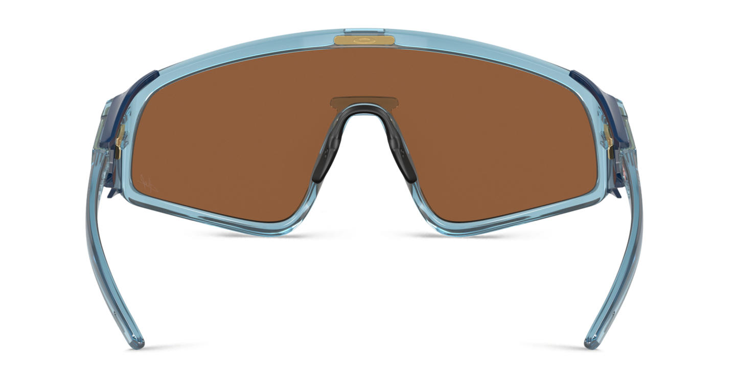 Shop Oakley Latch Panel Unisex Mask Sunglasses in Transparent Blue online.