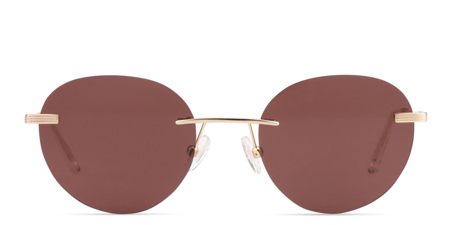 Shop TRICE Rimless Round Sunglasses in Gold online.