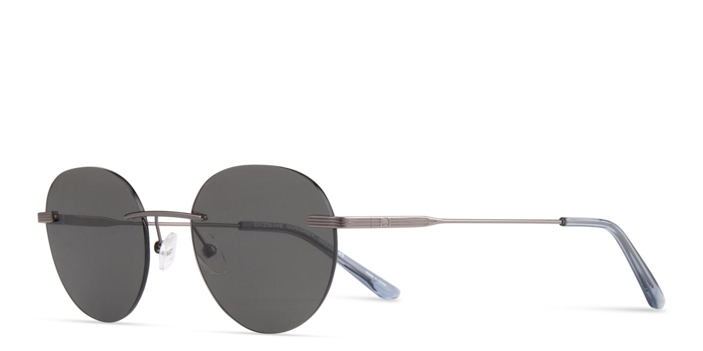 TRICE Rimless Round Sunglasses in Gunmetal – Product Photo 1