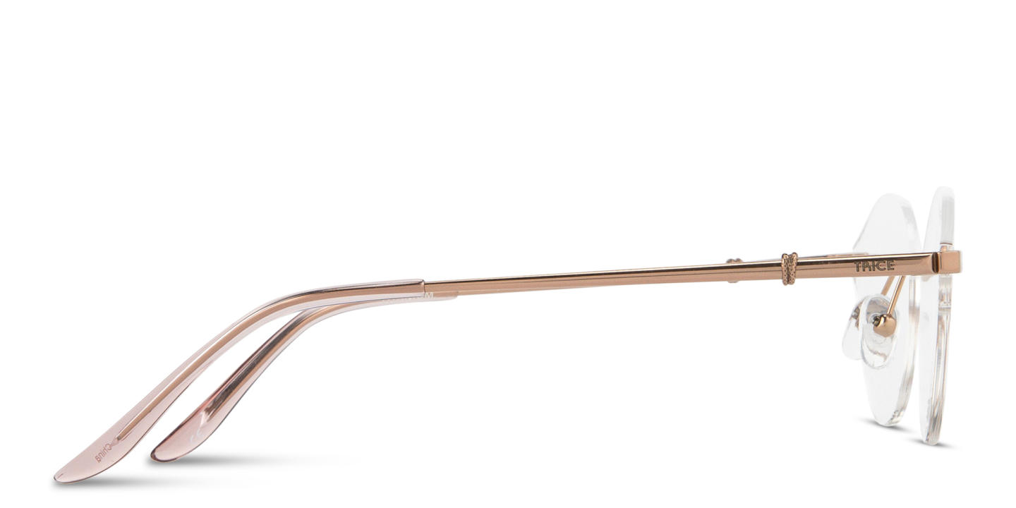 Shop TRICE Logo Wide Rimless Irregular Eyeglasses in Rose Gold online.