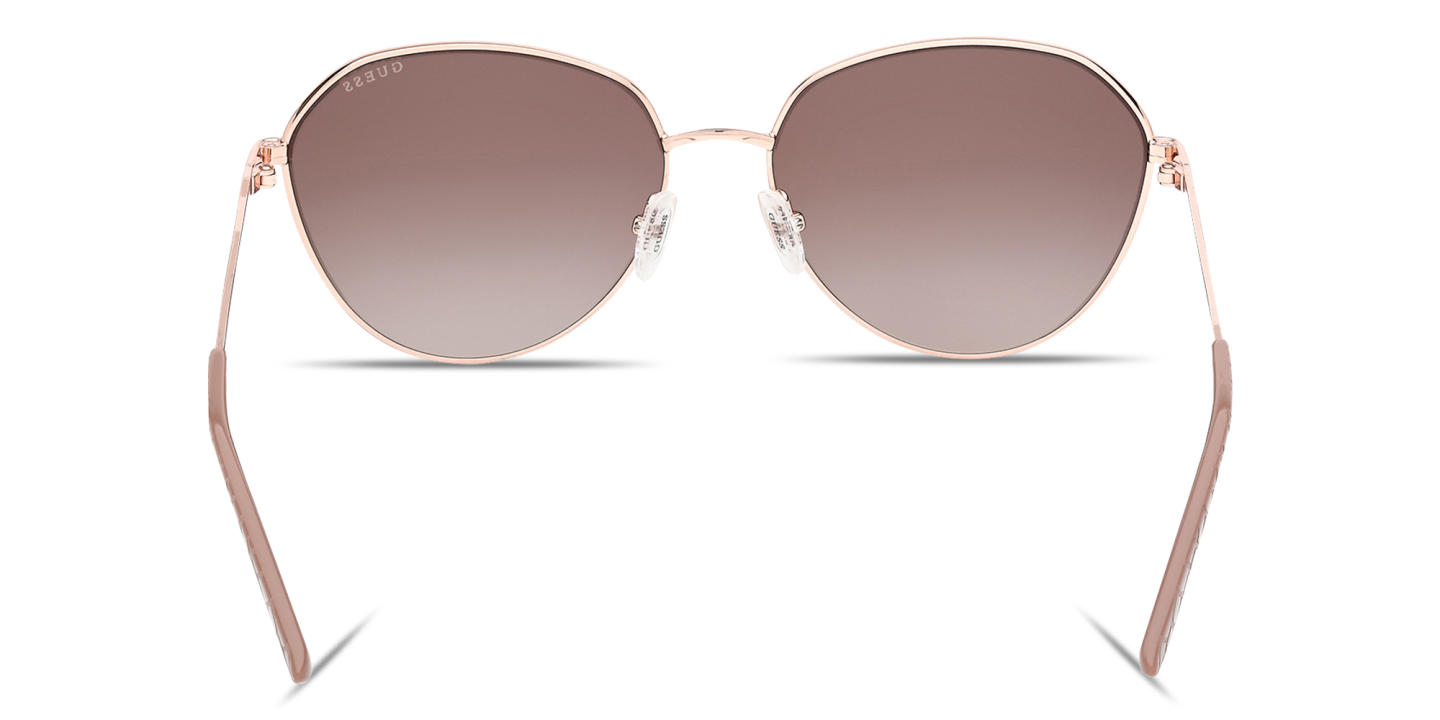 Shop Guess Logo Lettering Round Sunglasses in Beige online.