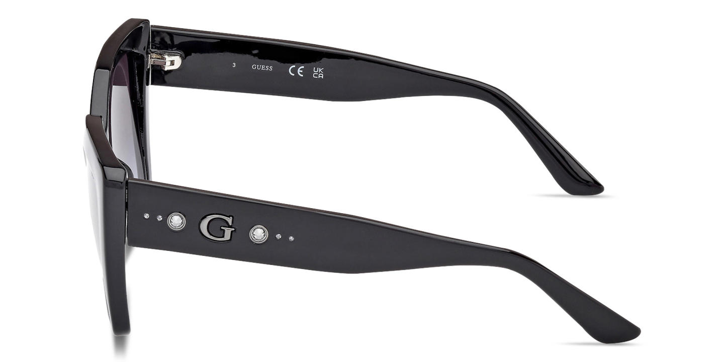 Shop Guess Rhinestone-Embellished Cat-Eye Sunglasses in Black online.