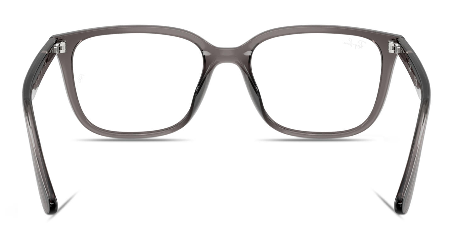 Shop Ray-Ban Embossed Logo Unisex Wide Square Eyeglasses in Transparent Opal Grey online.
