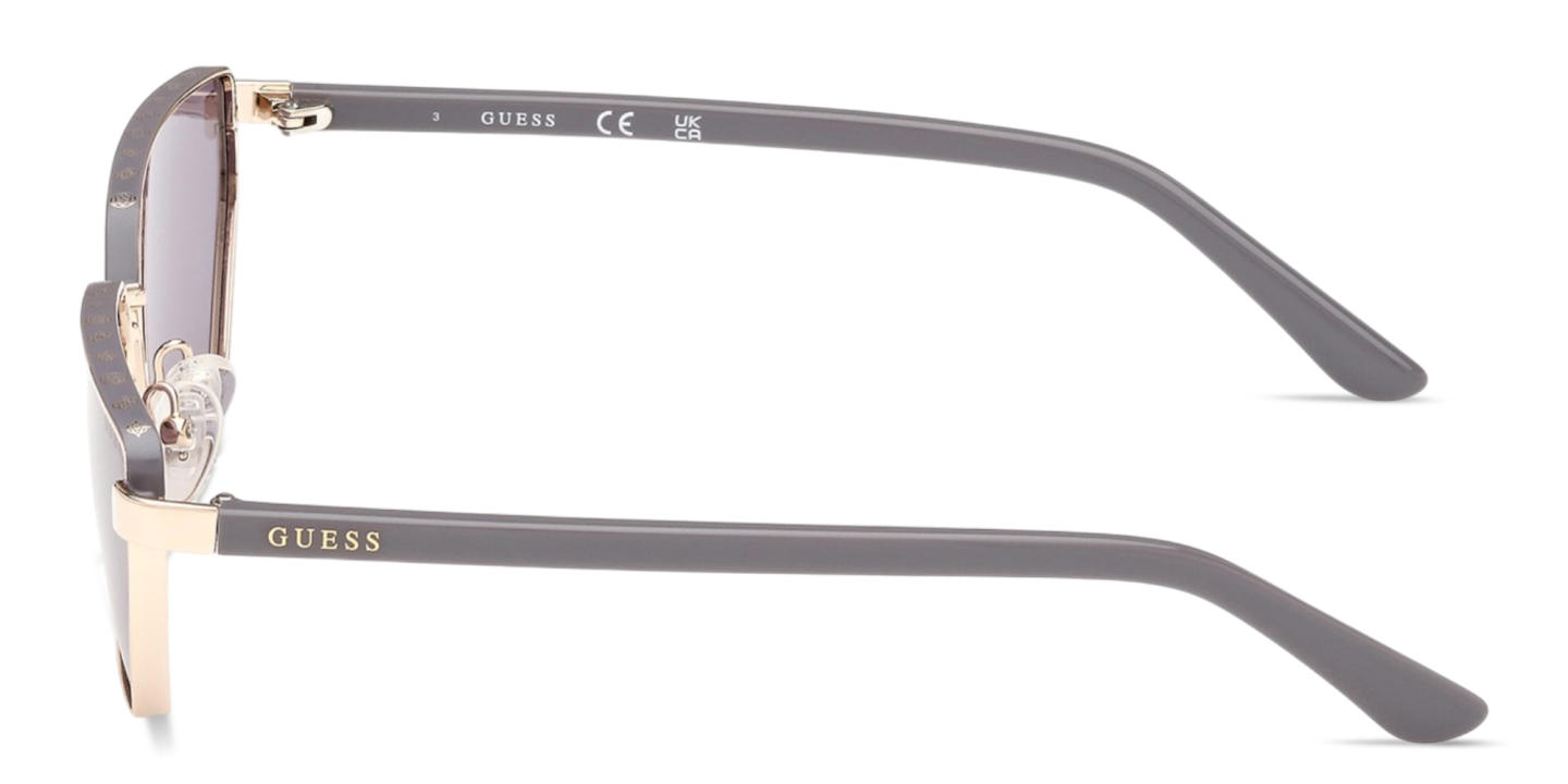 Shop Guess Logo Lettering Irregular Sunglasses in Pale Gold online.