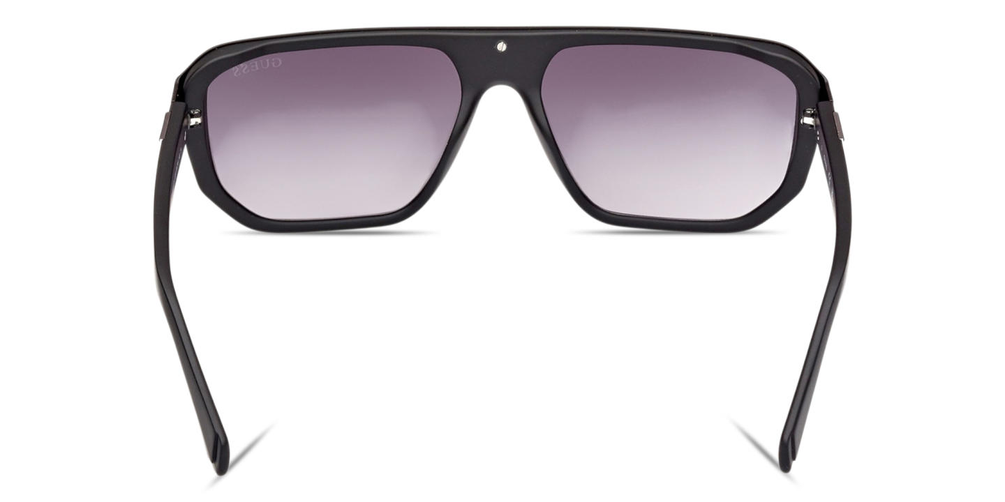 Shop Guess G Logo Irregular Sunglasses in Matte Black online.