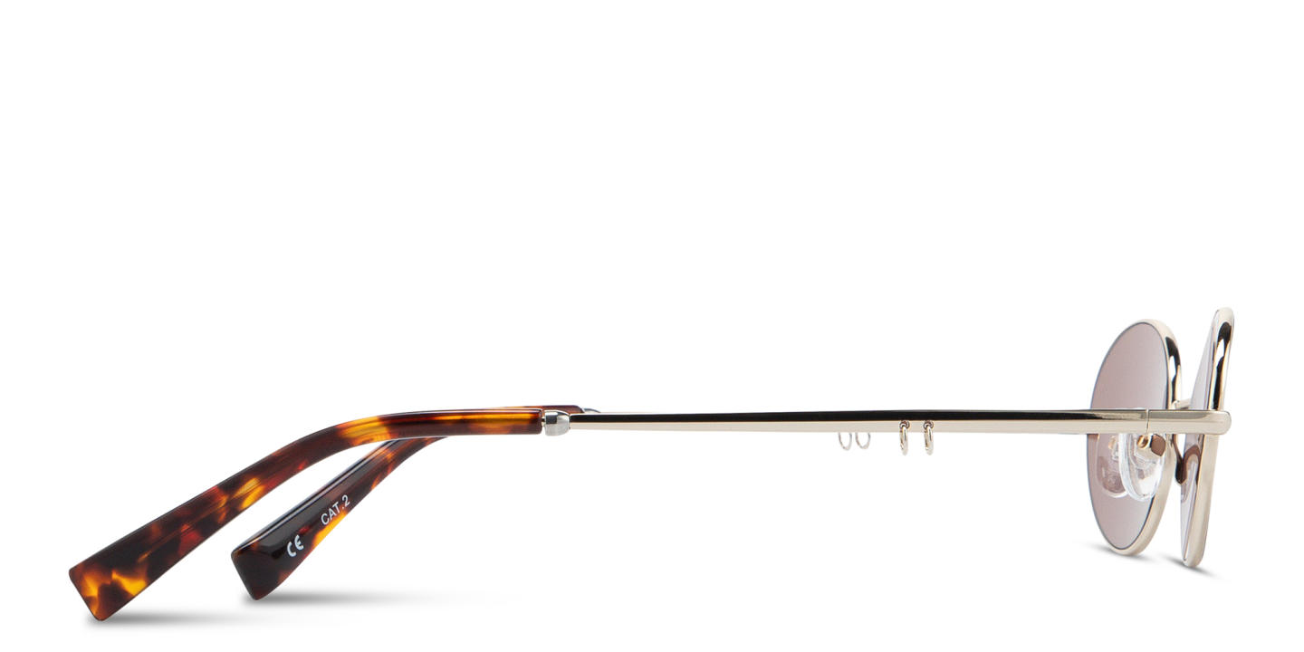 Shop TRICE Mila Chain Oval Sunglasses in Light Gold online.