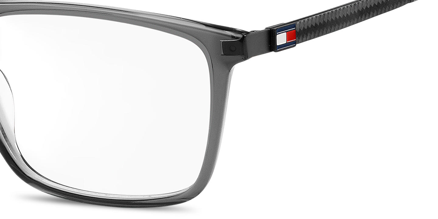 Shop Tommy Hilfiger Logo Wide Rectangle Eyeglasses in Transparent Grey online.