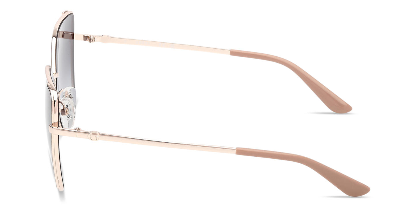 Shop Guess G Logo Butterfly Sunglasses in Gold online.