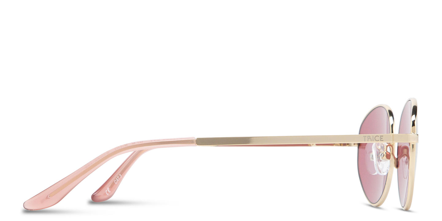 Shop TRICE Engraved Logo Irregular Sunglasses in Gold online.