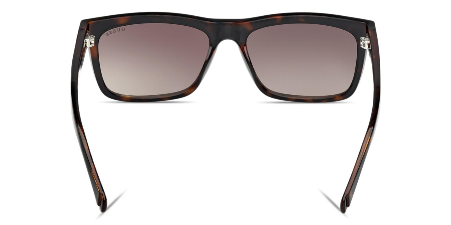 Shop Guess G Logo Rectangle Sunglasses in Havana online.