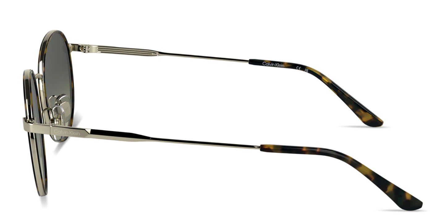 Shop Calvin Klein Engraved Logo Unisex Round Sunglasses in Havana Silver online.