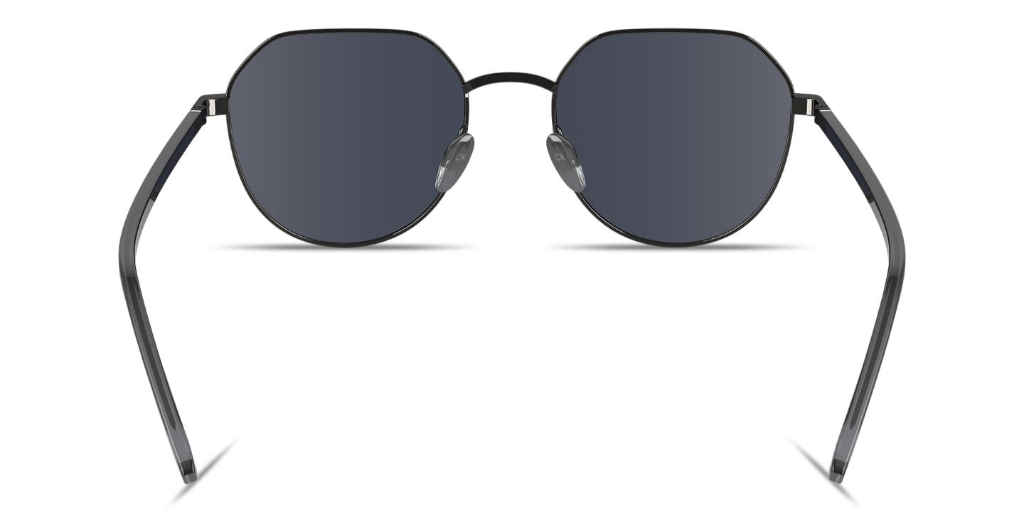 Shop Calvin Klein Engraved Logo Unisex Irregular Sunglasses in Gunmetal online.