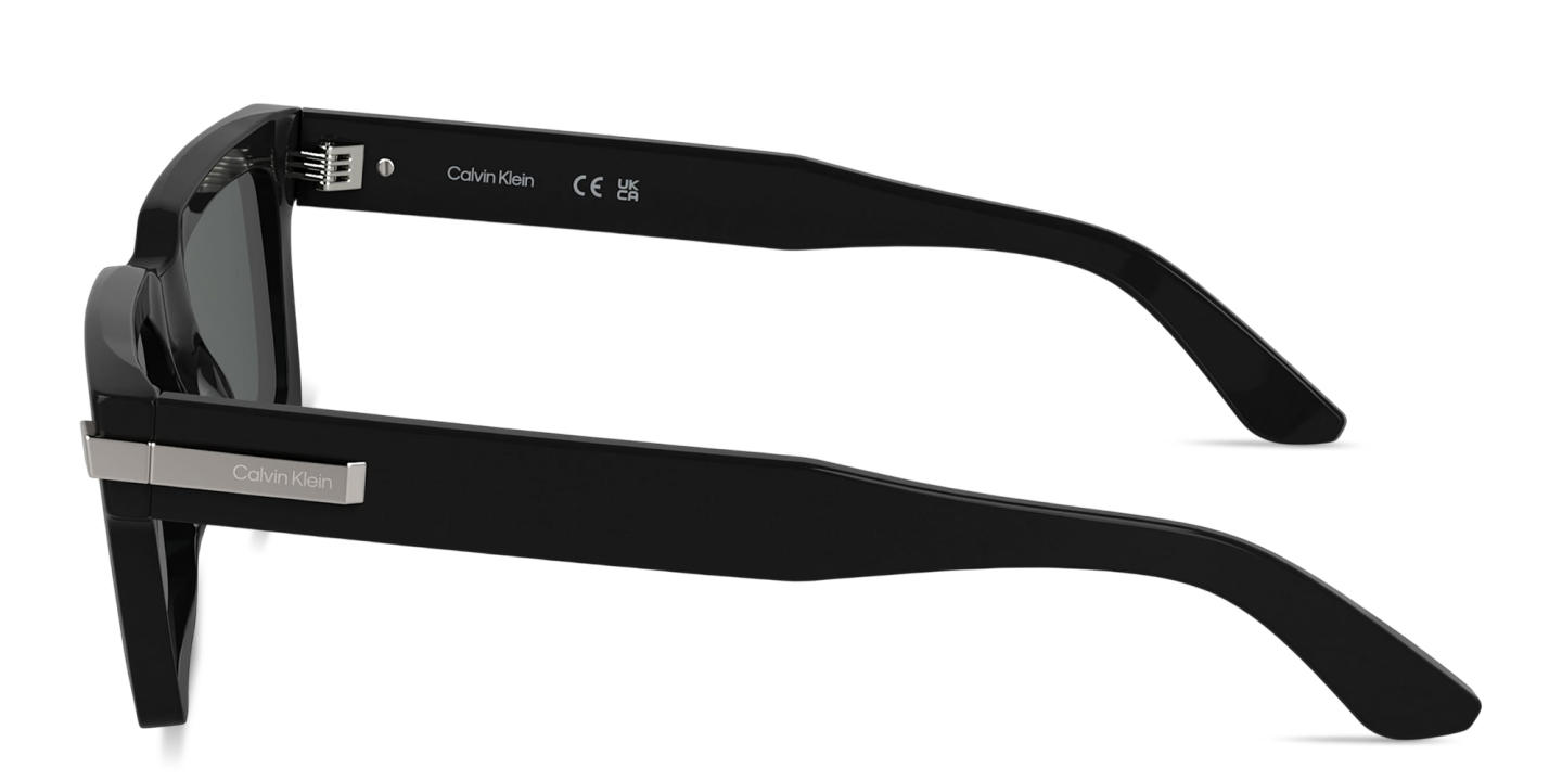 Shop Calvin Klein Logo Lettering Unisex Rectangle Sunglasses in Black online.