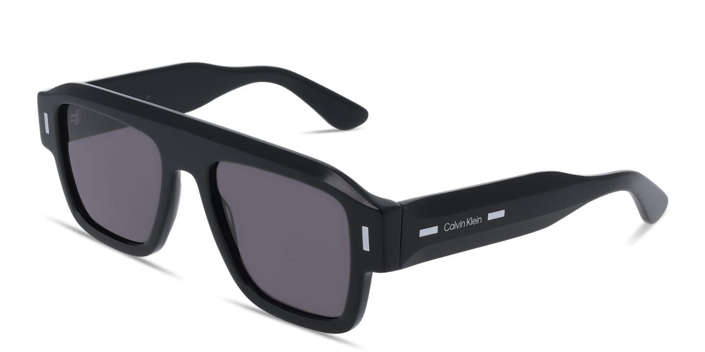 Shop Calvin Klein Logo Lettering Rectangle Sunglasses in Black online.