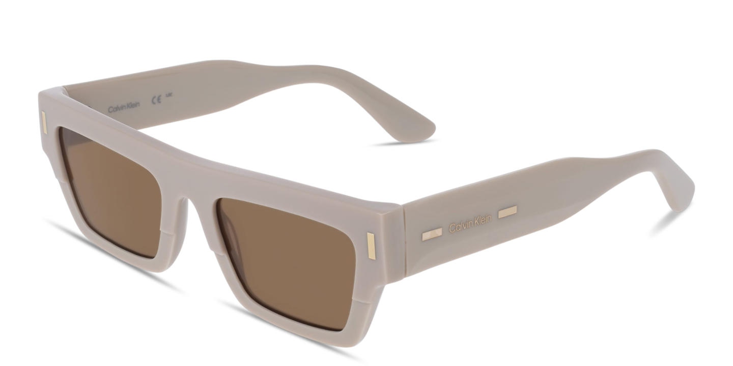 Shop Calvin Klein Logo Lettering Unisex Rectangle Sunglasses in Beige online.