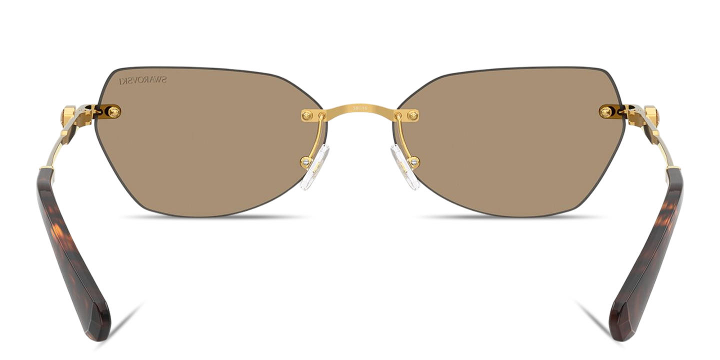 Shop Swarovski Crystal-Embellished Rimless Irregular Sunglasses in Gold online.