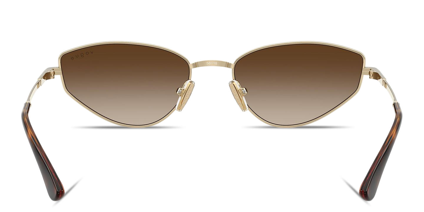 Shop Vogue Eyewear Engraved Logo Cat-Eye Sunglasses in Pale Gold online.