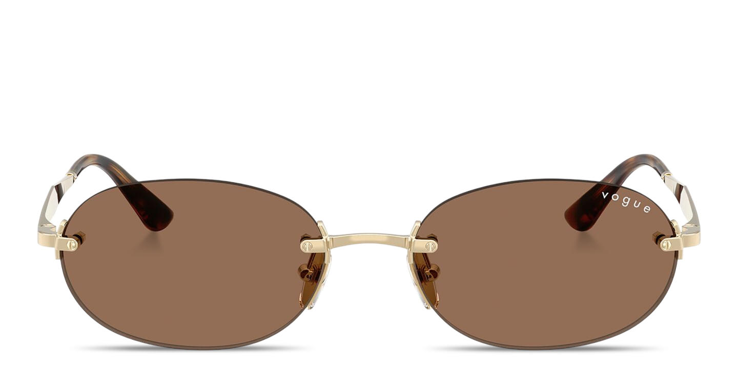 Shop Vogue Eyewear Engraved Logo Rimless Oval Sunglasses in Pale Gold online.
