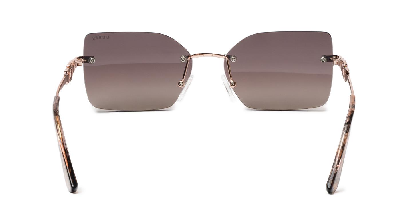 Shop Guess Crystal G Logo Rimless Square Sunglasses in Rose Gold online.