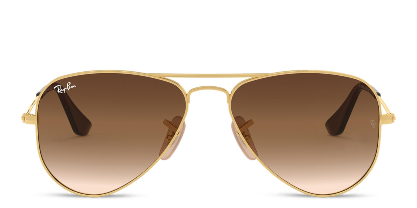 Shop Ray-Ban Junior Kids Pilot Sunglasses in Metal in Polished Gold online.