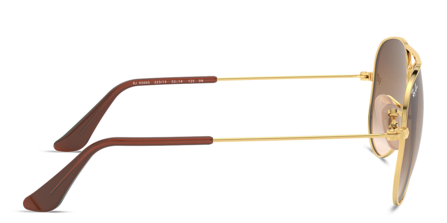 Shop Ray-Ban Junior Kids Pilot Sunglasses in Metal in Polished Gold online.