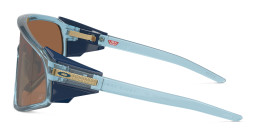 Shop Oakley Latch Panel Unisex Mask Sunglasses in Transparent Blue online.