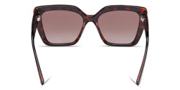 Shop Guess Rhinestone-Embellished Cat-Eye Sunglasses in Havana online.