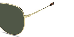 Shop Tommy Hilfiger Engraved Logo Aviator Sunglasses in Gold online.