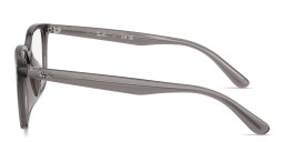 Shop Ray-Ban Embossed Logo Unisex Wide Square Eyeglasses in Transparent Opal Grey online.