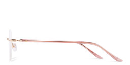 Shop TRICE Logo Unisex Rimless Round Eyeglasses in Gold online.