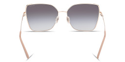 Shop Guess G Logo Butterfly Sunglasses in Gold online.