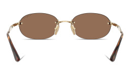 Shop Vogue Eyewear Engraved Logo Rimless Oval Sunglasses in Pale Gold online.