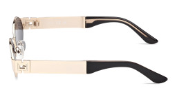 Shop Guess Iris Oval Sunglasses in Gold online.