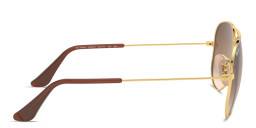 Shop Ray-Ban Junior Kids Pilot Sunglasses in Metal in Polished Gold online.
