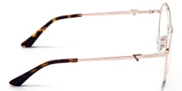 Shop Guess Round Eyeglasses in Gold online.