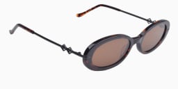 Shop Karen Wazen Olivia Oval Sunglasses in Tortoise online.