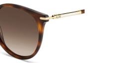Shop Carolina Herrera Logo Round Sunglasses in Brown online.
